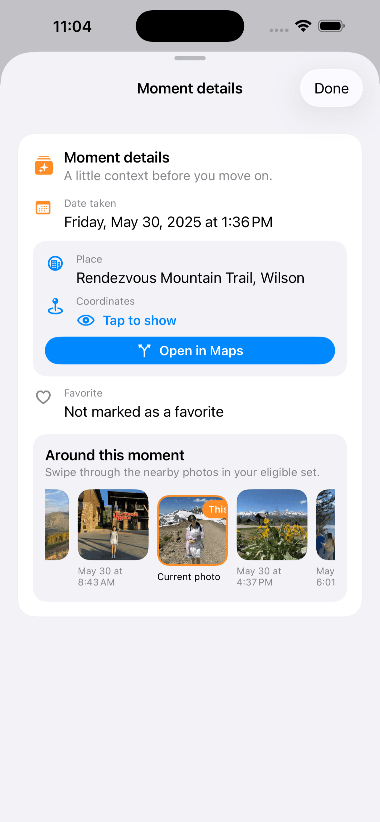 Photo Jogger moment details sheet with the coordinates hidden until the user chooses to reveal them.